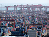 Trade containers are stacked at a container terminal in Busan Port on Feb. 22. [YONHAP]