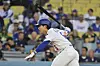 Los Angeles Dodgers' Kim Hye-seong follows through on an infield single in the second inning of a baseball game against the Oakland Athletics on May 14, in Los Angeles. [AP/YONHAP]