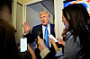 U.S. President Donald Trump talks to members of the press aboard Air Force One during a flight to Joint Base Andrews, Maryland on April 6. [REUTERS/YONHAP]