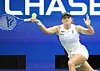Iga Swiatek of Poland returns a ball to Amanda Anisimova of the United States during their women's singles quarterfinals match at the U.S. Open at the USTA Billie Jean King National Tennis Center in New York on Sept. 3. [UPI/YONHAP]