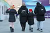 A family walks in Gwanghwamun Square in Jongno District, central Seoul, on Dec. 25, 2025. [YONHAP]