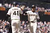 San Francisco Giants' Lee Jung-hoo, right, celebrates after hitting a two-run home run that also scored Wilmer Flores during the seventh inning of a baseball game against the Arizona Diamondbacks in San Francisco on May 14. [AP/YONHAP]