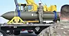 In this photo released by the U.S. Air Force on May 2, 2023, airmen look at a GBU-57, or the Massive Ordnance Penetrator bomb, at Whiteman Air Base in Missouri. [AP/YONHAP]