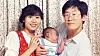Democratic Party presidential candidate Lee Jae-myung, right, and his wife Kim Hye-kyung pose for a commemorative photo holding their son early in their marriage. [LEE JAE-MYUNG]