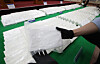About 600 kilograms (1,323 pounds) of cocaine worth 300 billion won ($210.5 million) is displayed during a joint press briefing on the largest-ever drug smuggling case at Busan Port, held at the Busan District Prosecutors’ Office on Aug. 6. [NEWS1]