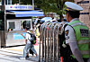 Police officers stand guard as elementary students head home from school in Seodaemun District, western Seoul, on Sept. 8. [NEWS1]