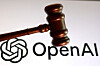 OpenAI logo and court gavel appear in this illustration taken Aug. 26, 2025. [REUTERS/YONHAP]