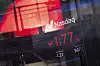 Market prices displayed at the Nasdaq MarketSite on April 7 in New York [AP/YONHAP]