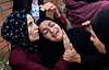 Mourners react during the funeral of a Palestinian killed in what the Gaza health ministry says was Israeli fire near a distribution center in Rafah, at Nasser hospital in Khan Younis, in the southern Gaza Strip, June 15, 2025. [REUTERS/YONHAP]