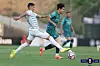 Jeonbuk Hyundai Motors' Tiago Orobo, left, vies for the ball with Gimpo FC's Heo Dong-ho during a Korea Cup round of 16 match at Gimpo Solteo Football Stadium in Gimpo, Gyeonggi on June 19. [KFA]