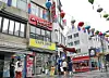 The red sign of the Peruvian restaurant Ceviche 210 stands out among the other English signs. [PARK SANG-MOON]