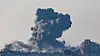 Smoke rises from Gaza after an explosion, as seen from the Israeli side of the border, June 11, 2025. [REUTERS/YONHAP]