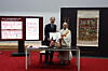 Sinheung Temple Chief Monk Ji-hye, right, and Max Hollein, director and CEO of the Metropolitan Museum of Art, hold up a copy of an agreement during a press conference on the return of a ″Ten Kings of Hell″ painting to the temple, during a press conference at the KGIT Center in Mapo District, western Seoul, on Nov. 14. [YONHAP]