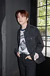 Member Woonhak of boy band BoyNextDoor poses for photos prior to an interview with reporters on May 9 in western Seoul. [KOZ ENTERTAINMENT]