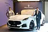 Designer Ken Okuyama and Maserati Korea Managing Director Takayuki Kimura pose with the Colors of Seoul edition of the Grecale SUV. [MASERATI KOREA]