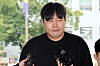 Comedian Lee Jin-ho appears at the Seoul Gangnam Police Precinct on charges of compulsive gambling and fraud on Oct. 22, 2024. [NEWS1]
