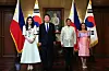 Korean President Yoon Suk Yeol, second from left, and his wife, Kim Keon Hee, pose with their counterparts, Ferdinand Marcos Jr. and Liza Araneta Marcos, prior to their luncheon at Malacanang Palace in Manila on Monday. [JOINT PRESS CORPS]