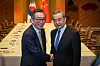 Foreign Minister Cho Tae-yul, left, poses with Chinese Foreign Minister Wang Yi during their talks in Tokyo on March 21, held a day before the planned trilateral meeting involving their Japanese counterpart, Takeshi Iwaya. Cho told Wang that Korea’s legitimate and lawful maritime rights 'must not be undermined by China’s activities in the Yellow Sea,' while Wang called for continued dialogue based on mutual respect, according to the Korean Foreign Ministry. [MINISTRY OF FOREIGN AFFAIRS]