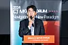 CJ ENM CEO Yoon Sang-hyun speaks during the company's press event in Busan on the sidelines of the Busan International Film Festival (BIFF) on Friday. [CJ ENM]