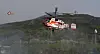 A firefighting helicopter on April 29 fights the fire at Mount Hamji in Daegu that started the day before. [NEWS1]