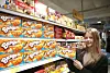 This undated file photo provided by Orion shows a customer holding the company's Bungo pie at a supermarket outlet in Russia. [YONHAP]