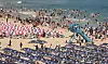 Visitors at Haeundae Beach in Busan play in the water and sand on July 27, in this photo unrelated to the story. [YONHAP]