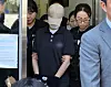 A first lieutenant walks out of Chuncheon District Court in Gangwon in June after completing a questioning session for an arrest warrant. [NEWS1]