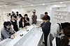 Visitors look around items made by ingredients native to Jeju Island at a booth at Jeju International Airport on June 12. [JOINT PRESS CORPS]