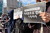 Dongduk Women's University students hold signs asking the university consider results of the student vote during a press conference on Dec. 9. [NEWS1]