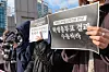 Dongduk Women's University students hold signs asking the university consider results of the student vote during a press conference on Dec. 9. [NEWS1]