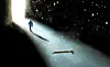 An animated image shows a person walks alone toward a door where light comes in. [JOONGANG ILBO]