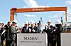President Lee Jae-myung, at the center, applauds after signing the guestbook during his visit to Philly Shipyard in Philadelphia, Pennsylvania, on Aug. 26. To his left is Hanwha Group Vice Chairman Kim Dong-kwan. [JOINT PRESS CORPS]