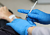 A citizen gets vaccinated for Covid-19 at a hospital in western Seoul on Oct. 19, 2023. [NEWS1]