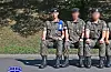 Cha Eun-woo, left, with his comrades in the Korea Army Training Center, image released on Aug. 13 [SCREEN CAPTURE]