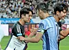 Team K League's Yang Min-hyuk, left, shakes hands with Tottenham Hotspur captain Son Heung-min before a Coupang Play Series match at the Seoul World Cup Stadium in western Seoul on July 31. [NEWS1]