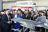 Kang Goo-young, CEO of Korea Aerospace Industries, far left, explains the domestically developed KF-21 fighter jet to Malaysian Prime Minister Anwar Ibrahim, second from left, during the LIMA 2025 defense exhibition in Langkawi, Malaysia, on May 20. [KOREA AEROSPACE INDUSTRIES]