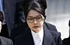 Former first lady Kim Keon Hee leaves the Seoul Central District Court in Seocho District, southern Seoul, after her warrant hearing on Aug. 12. [JOINT PRESS CORPS]