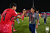 Korea's under-17 national football team manager, Baek Ki-tae, high-fives players after defeating the Ivory Coast 3-1 at Aspire Zone in Doha, Qatar, on Nov. 11. [YONHAP]