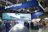 Visitors look around the HD Hyundai Heavy Industries booth at Madex 2023, the International Maritime Defense Industry Exhibition, at Bexco in Busan on June 7, 2023. [YONHAP]