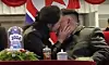 Kim Ju-ae, the daughter of North Korean leader Kim Jong-un, kisses her father on the cheek after the New Year’s countdown ends during the 2026 New Year’s celebration performance at the May Day Stadium in Pyongyang on Jan. 1. [KOREAN CENTRAL TELEVISION]
