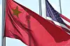 A Chinese and American flag fly outside a Paslin facility on April 23, 2025, in Warren. [AP/YONHAP]