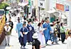 Foreign tourists crowd Gamcheon Culture Village in Busan on May 26. [YONHAP]