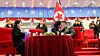 Kim Ju-ae kisses her father North Korean leader Kim Jong-un on the cheek as the new year begins in footage from a New Year’s celebration broadcast by Korean Central Television on Jan. 1. [KOREAN CENTRAL TELEVISION]