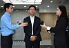 Science Minister nominee Bae Kyung-hoon, center, answers questions from reporters as he arrives at the confirmation hearing preparation office at Gwanghwamun Post Office in central Seoul on June 24. [YONHAP]