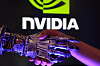 A person shakes hands with a 3-D-printed robot's hand in front of the Nvidia logo in this illustration from Aug. 27. [REUTERS/YONHAP]