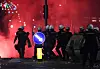 Protesters throw projectiles at riot police officers after a student-led rally in Belgrade, Serbia, on June 28. [EPA/YONHAP]