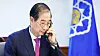 Acting President and Prime Minister Han Duck-soo speaks during a phone call with U.S. President Donald Trump on April 8. [NEWS1]