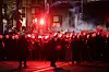 Protestors throw projectiles at riot police officers after a student-led rally in Belgrade, Serbia on June 28. [EPA/YONHAP]