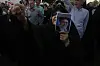 A protester chants slogans as she holds a poster of the Iranian Supreme Leader Ayatollah Ali Khamenei in a protest following the U.S. attacks on nuclear sites in Iran, in Tehran, Iran, Sunday, June 22, 2025. [AP/YONHAP]
