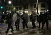 Riot police officers set up their positions after a riot broke out following a student-led rally in Belgrade, Serbia on June 28. [EPA/YONHAP]